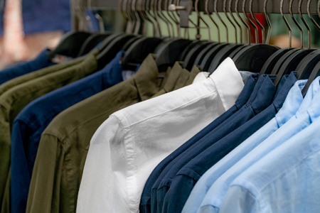 business clothes hanging showcase in store shopping.Professional look clothing.の写真素材