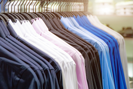 business clothes hanging showcase in store shopping.Professional look clothing.の写真素材