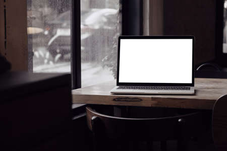 Blank screen laptop computer and Working with mobile device screen templateの写真素材