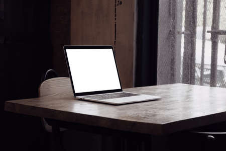 Blank screen laptop computer and Working with mobile device screen templateの写真素材