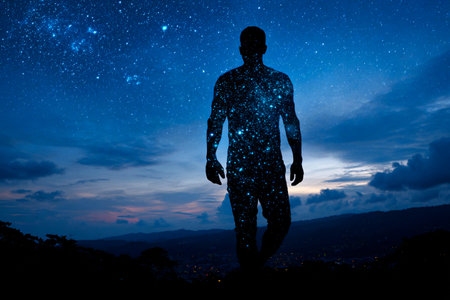 human silhouette filled with galaxy and constellations, cosmic connection to lifeの素材