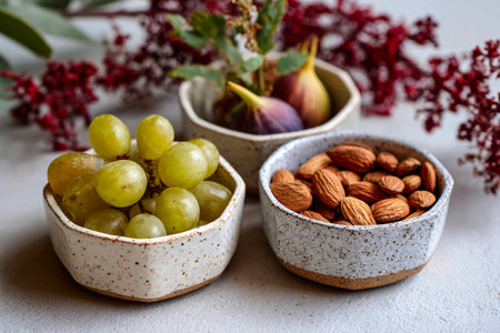 handcrafted ceramic bowls filled with seasonal organic produce, wholesome food artの素材