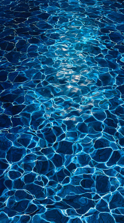 Rippled dark blue water surface with soft, flowing motionの素材