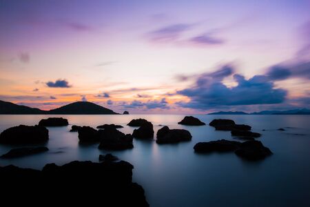 Amazing sunset beach. Long exposure of soft and colorful sunset