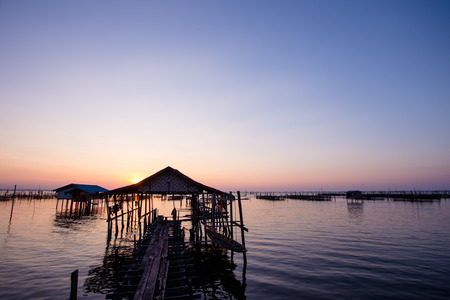 Paradise vacations tropical jetty on sea with the evening light.の写真素材