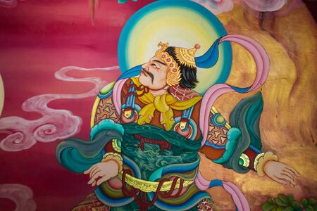 Mural in native thai style painting on the wall of buddhist church, public places, Thailandのeditorial素材