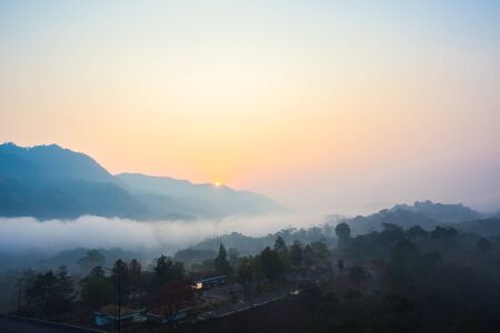 View fog and mountains at sunrise.の写真素材
