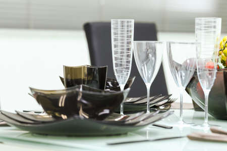 Empty bowls, plates, cups and glasses on tableware.の写真素材