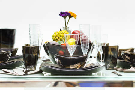 Empty bowls, plates, cups and glasses on tableware.