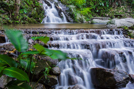 Beautiful waterfall in deep forest at national park.の写真素材