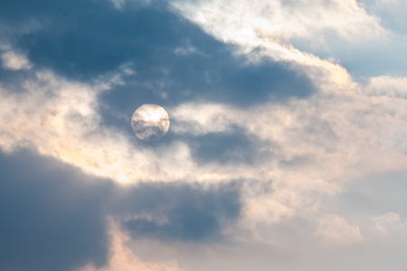 Full sun and clouds in the skyの写真素材