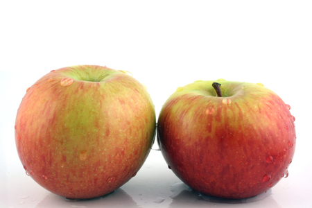 Close up of 2 Washed Applesの写真素材