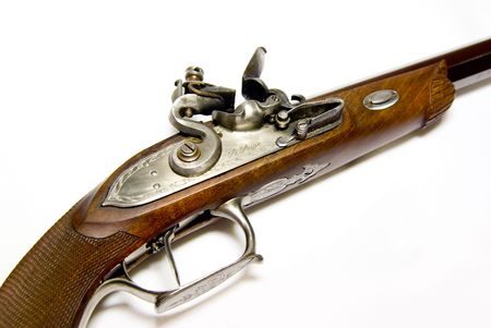 Antique handgun on a white backgroundの写真素材
