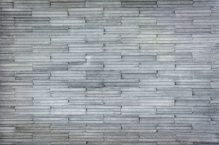 Modern gray slate Stone Wall - Background Textureの写真素材