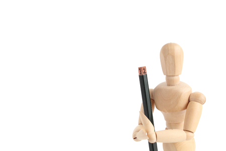 Drawing doll and pencilの写真素材