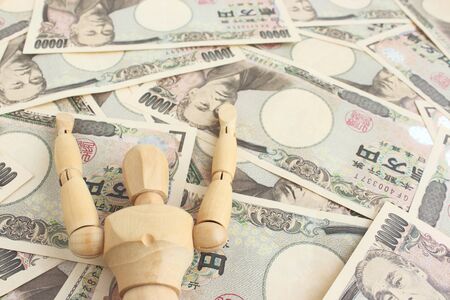Drawing dolls and Japanese moneyの写真素材