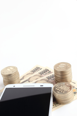 Smartphone and Japanese moneyの写真素材
