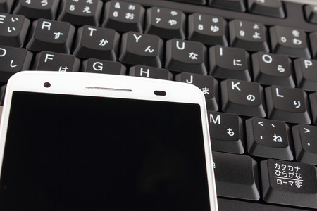 Smartphone and keyboardの写真素材