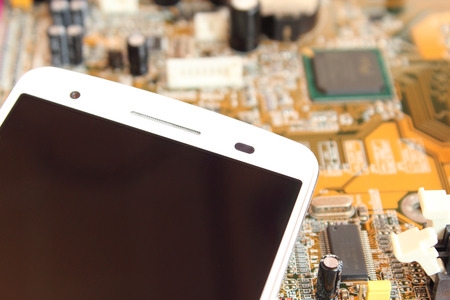 Smartphone and electrical boardの写真素材