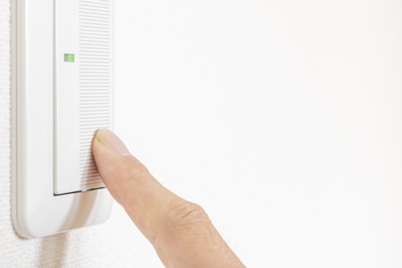 Press the light switchの写真素材