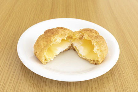 Cream puff on a dish