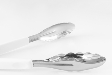 Up of metal tongsの写真素材