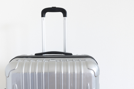 Close up of a suitcase on white backgroundの写真素材