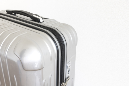 Close up of a suitcase on white backgroundの写真素材