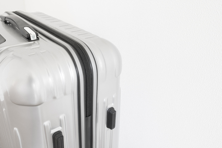 Close up of a suitcase on white backgroundの写真素材