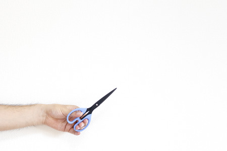 Man hand with scissorsの写真素材