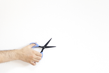 Man hand with scissorsの写真素材