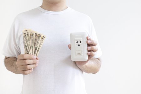 Man and electricity bill imageの写真素材