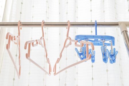 Image of hanging laundry in the roomの写真素材