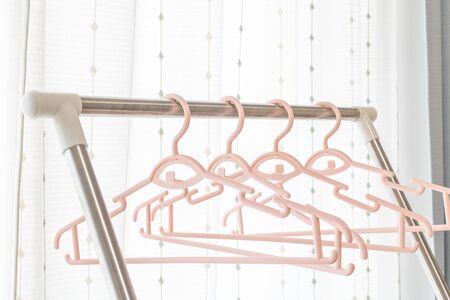 Image of hanging laundry in the roomの写真素材