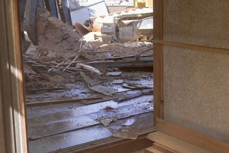 Demolition of old wooden house in Japan