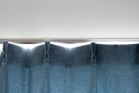 Image of light entering through the gap between curtainsの写真素材