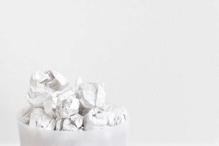 Trash with lots of waste paperの写真素材