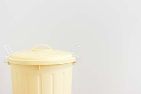 Yellow 45L trash can on white backgroundの素材 [FY310152653515]