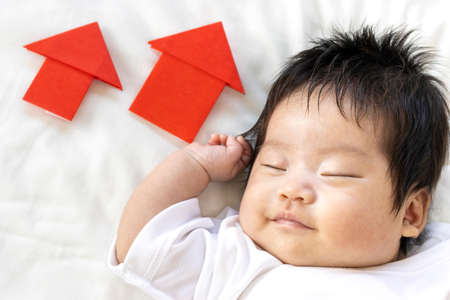 Baby and up arrow. Image of growthの写真素材