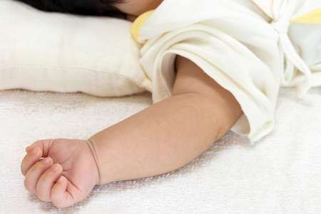 Right arm of a 2 month old baby