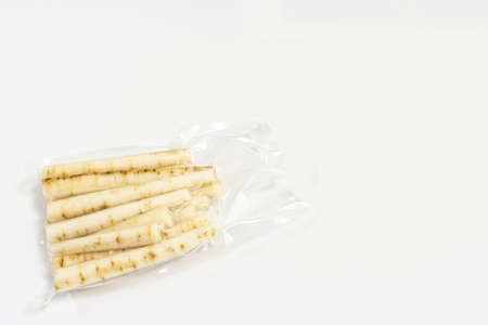 Cut and vacuum packed burdockの写真素材