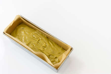 Pound cake in a mold before baking