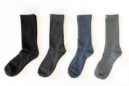 4 pairs of dark socks lined up