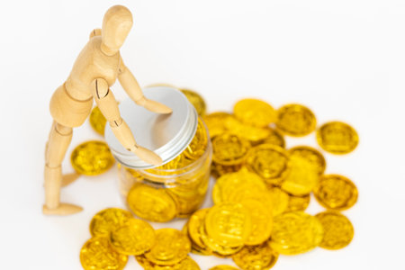 Drawing doll and lots of gold coins, white background, image to saveの写真素材
