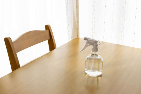Alcohol spray placed on the table. Alcohol disinfection imageの写真素材