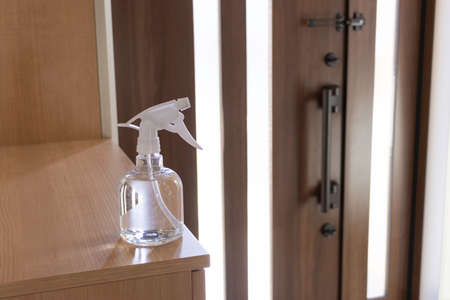 Alcohol spray placed at the entrance. Alcohol disinfection imageの写真素材