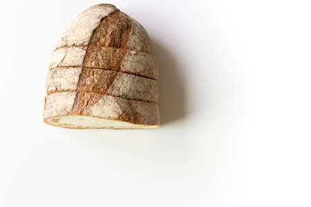 Cut French bread sprinkled with rye flourの写真素材