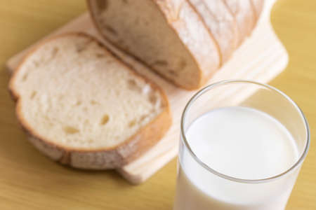 French bread and milk. Image of breakfastの写真素材