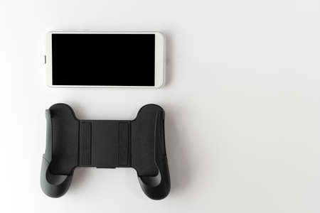 Smartphone with a grip stand for games