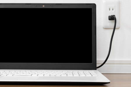 Image of charging a laptop
